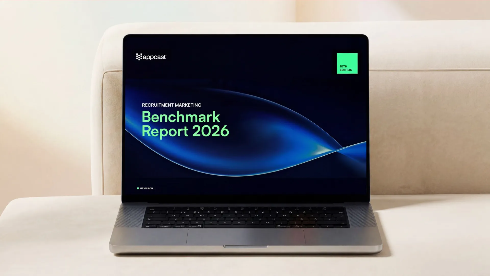 Appcast Benchmark Report 2026 cover on a laptop