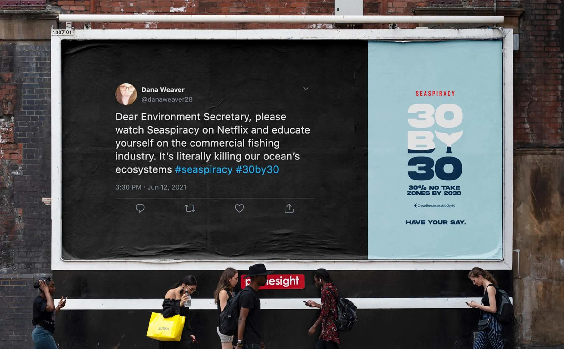 A street billboard pairing a public tweet about Seaspiracy with a 30 by 30 campaign poster