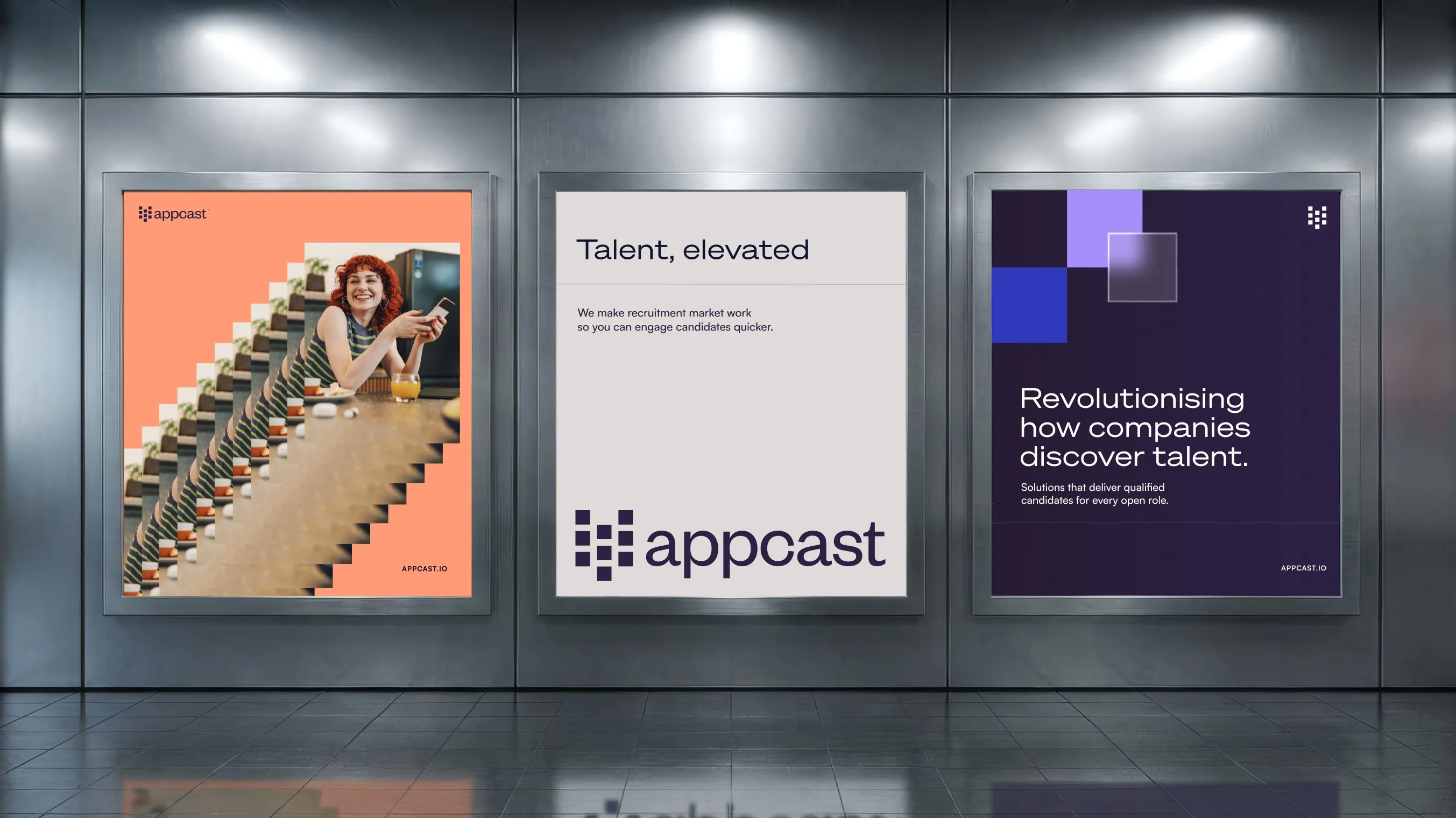 Three Appcast campaign posters in illuminated metro light boxes