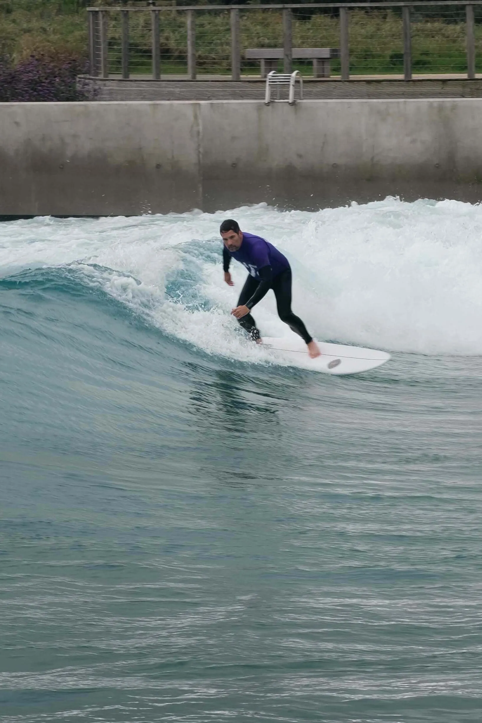 A surfer on a wave at The Wave