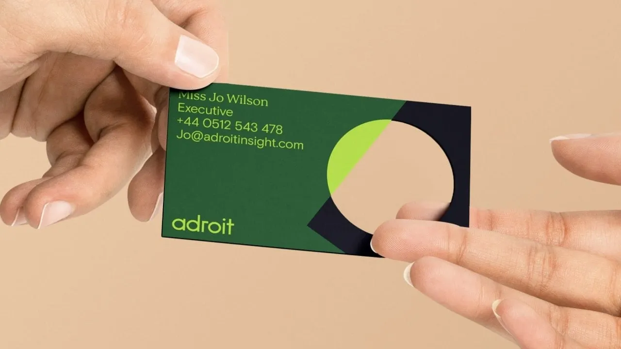 Adroit business card mockup held in two hands