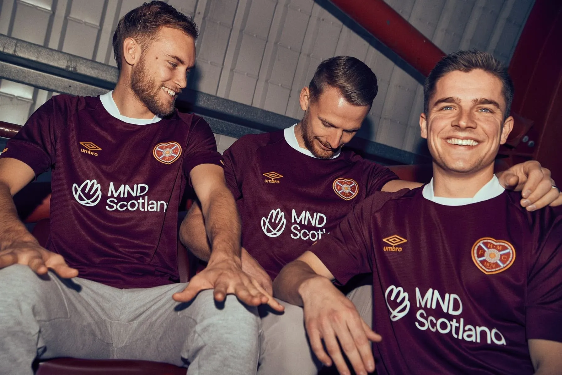 Hearts FC players wearing MND Scotland-branded football shirts